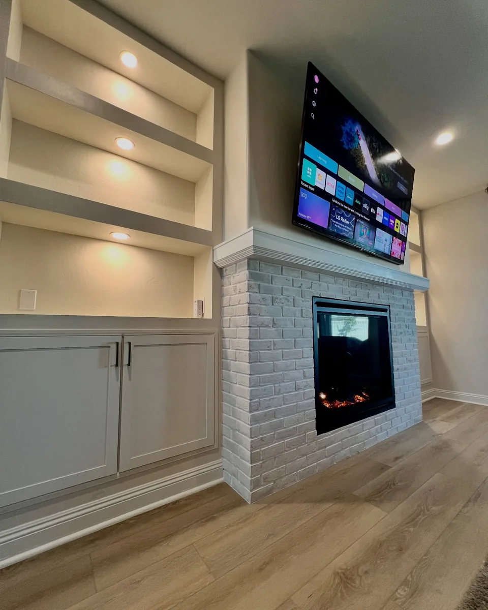 White brick fireplace detail.