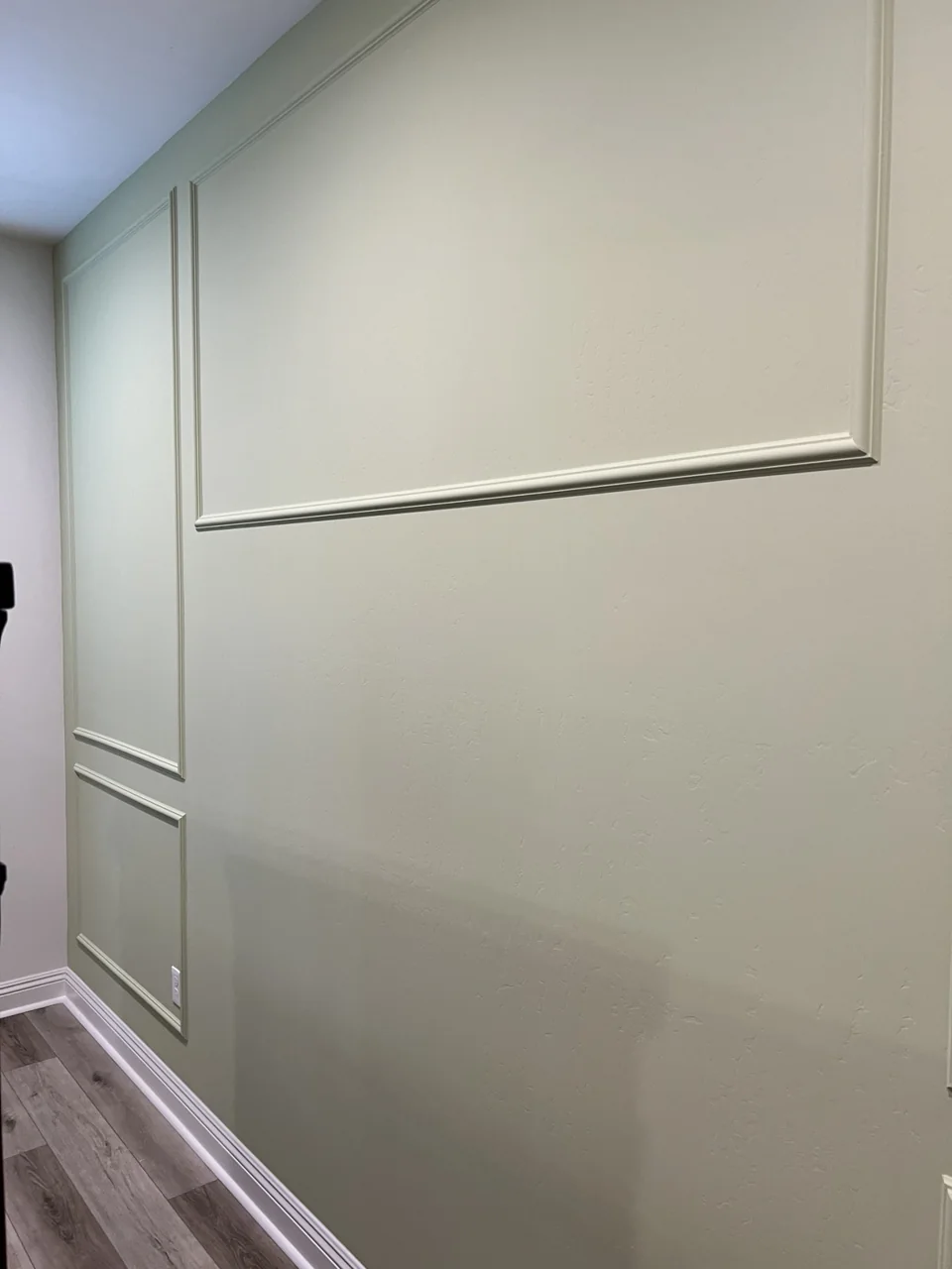 Applied wall molding adds dimension and a clean, finished rhythm.